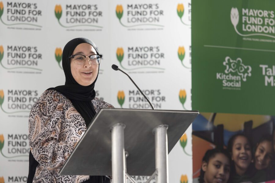 A member of the Mayor's Fund for London Youth Board speaking at a public event.