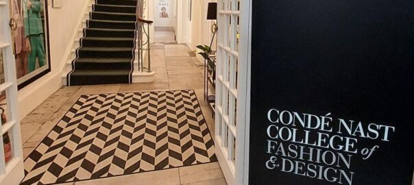 Entrance to Condè Nast College of Fashion & Design, open door and staircase